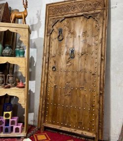 Decorative wooden door with traditional Arabic designs, crafted by ArabicDoors