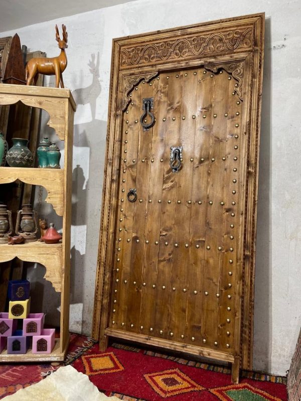 Decorative wooden door with traditional Arabic designs, crafted by ArabicDoors
