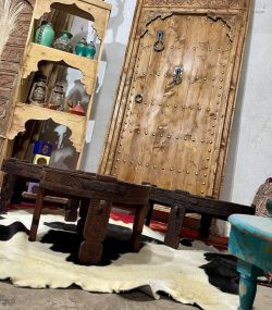 Moroccan-style handcrafted wooden door with arabesque carvings