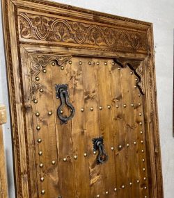 Decorative wooden door with traditional Arabic designs, crafted by ArabicDoors