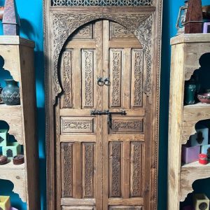 Traditional Moroccan carved wooden door with intricate details by ArabicDoors