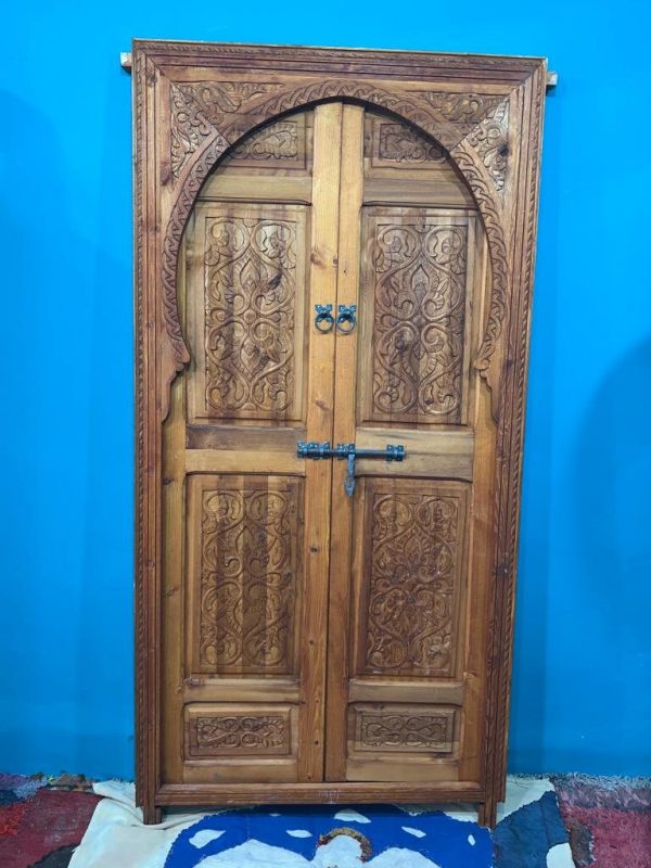Moroccan carved wooden door with intricate Arabic designs, handcrafted by ArabicDoors