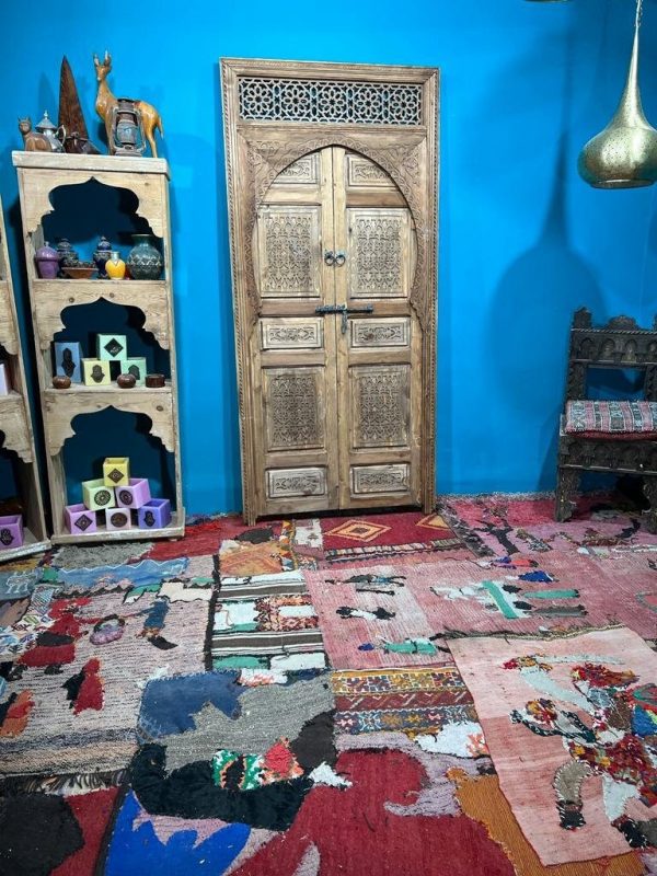 Moroccan carved wooden door with intricate Arabic designs, handcrafted by ArabicDoors