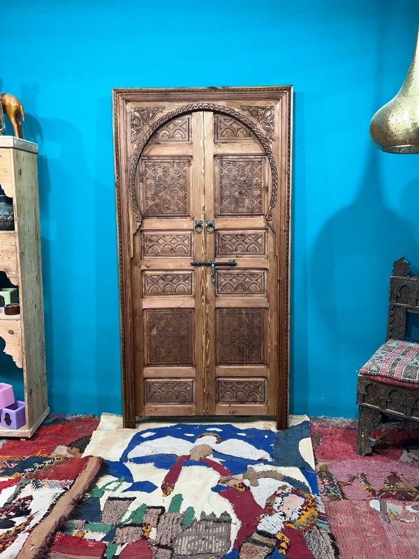 Moroccan carved wooden door with intricate Arabic designs, handcrafted by ArabicDoors