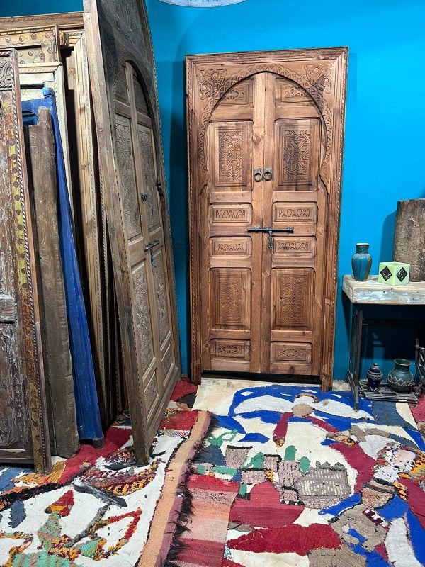Decorative wooden door with traditional Arabic designs, crafted by ArabicDoors