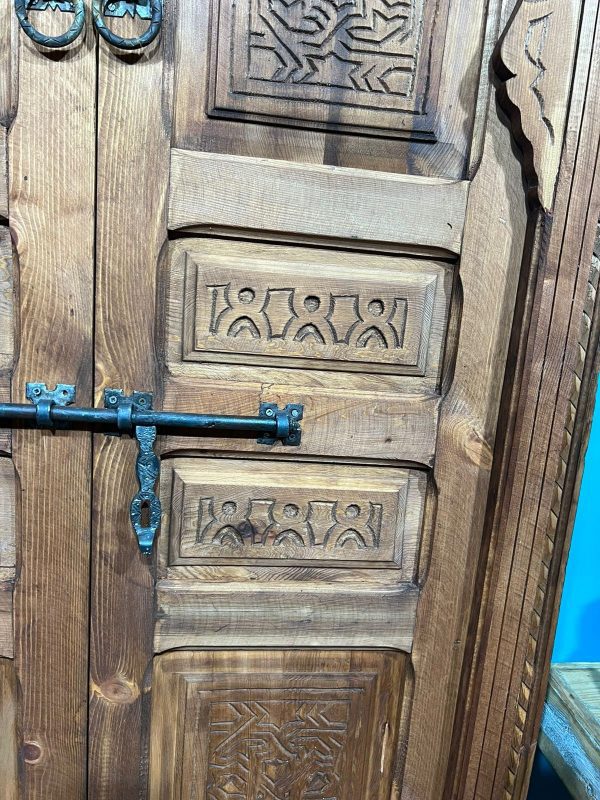 Decorative wooden door with traditional Arabic designs, crafted by ArabicDoors