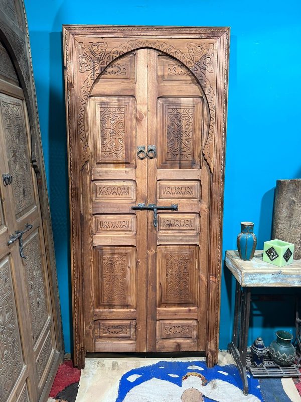 Decorative wooden door with traditional Arabic designs, crafted by ArabicDoors