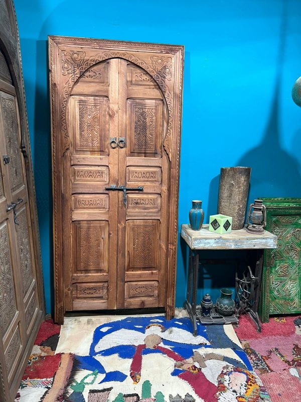 Decorative wooden door with traditional Arabic designs, crafted by ArabicDoors