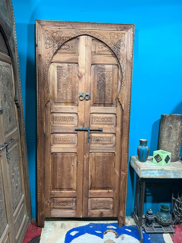 Decorative wooden door with traditional Arabic designs, crafted by ArabicDoors