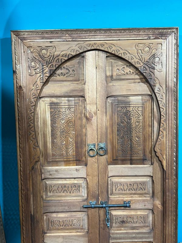 Decorative wooden door with traditional Arabic designs, crafted by ArabicDoors