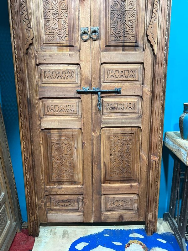 Decorative wooden door with traditional Arabic designs, crafted by ArabicDoors