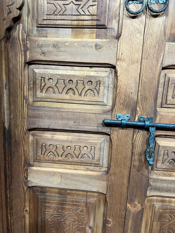 Decorative wooden door with traditional Arabic designs, crafted by ArabicDoors
