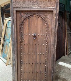 Large Moroccan Riad Door .Decorative wooden door with traditional Arabic designs,