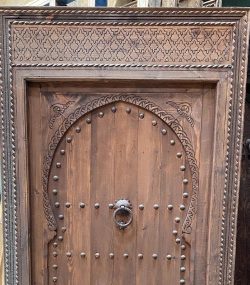 Large Moroccan Riad Door .Decorative wooden door with traditional Arabic designs,