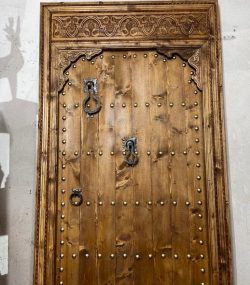 Decorative wooden door with traditional Arabic designs, crafted by ArabicDoors