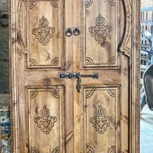 Traditional Moroccan carved wooden door with intricate details by ArabicDoors