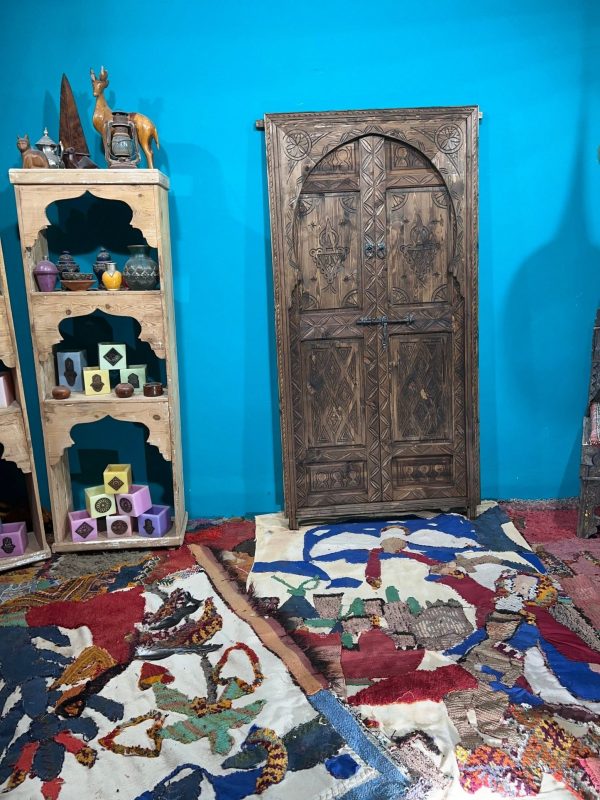 Moroccan-style handcrafted wooden door with carvings