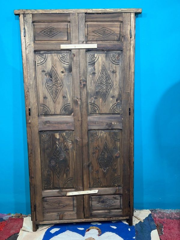 Moroccan-style handcrafted wooden door with carvings