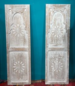 Moroccan-style handcrafted wooden door with carvings
