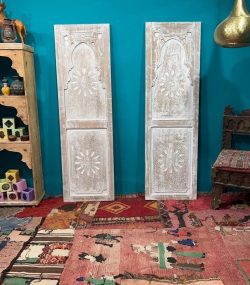 Moroccan-style handcrafted wooden door with carvings