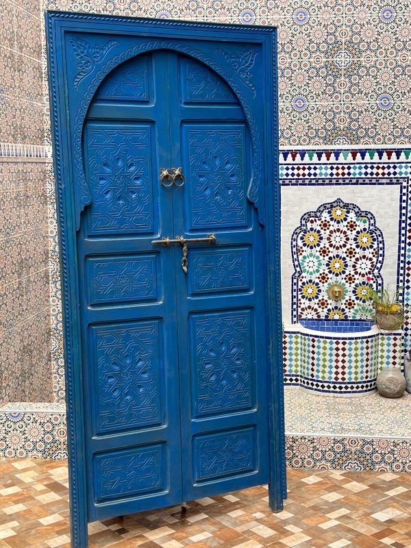 Hand-carved cedar door with arabesque patterns, handcrafted by ArabicDoors